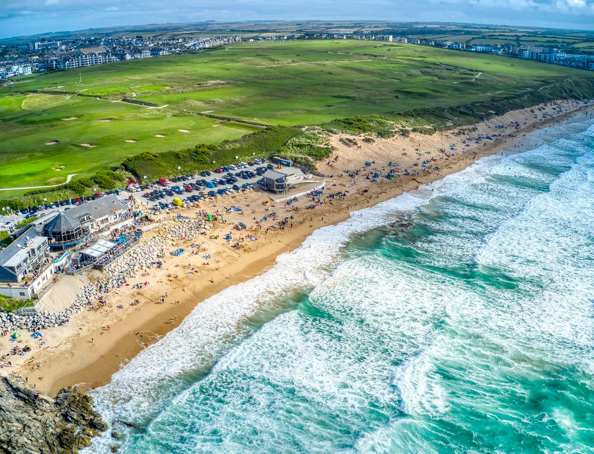 An aerial view of the beach on a sunny day