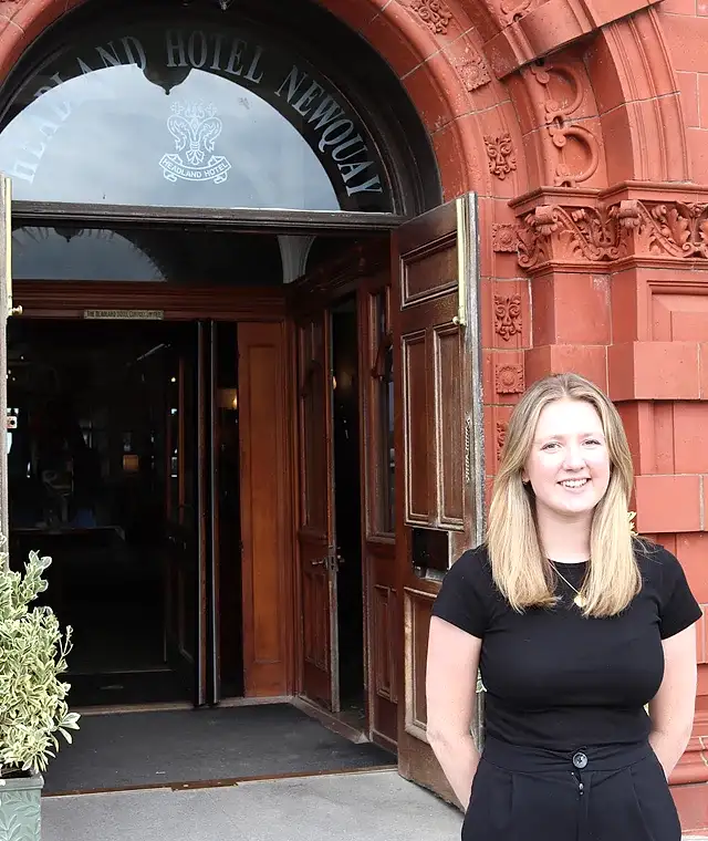 Beth standing outside the Headland Hotel
