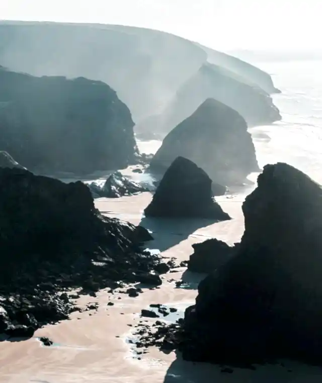 A view of misty rocks in the sea