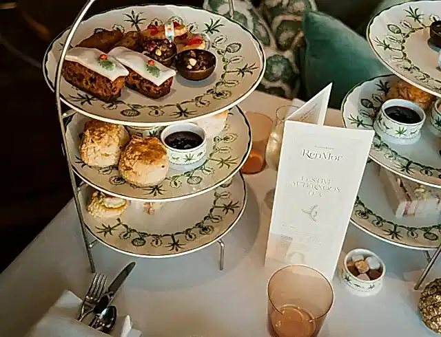 Two afternoon tea plates on a table
