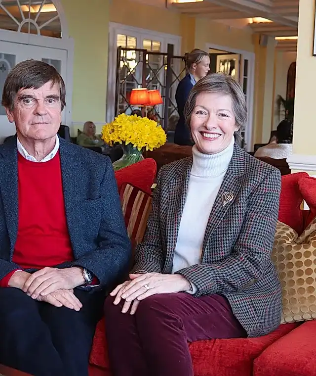 A couple sitting on the sofa