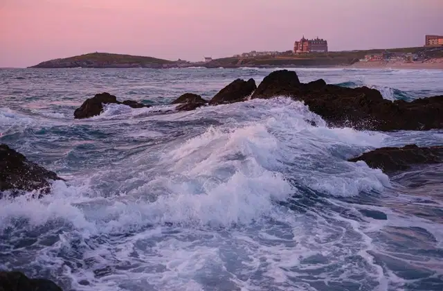 waves splashing onto rocks